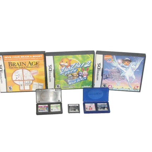 Nintendo DS Blue Handheld Game System with Case, Cord & Lot of 8 Games